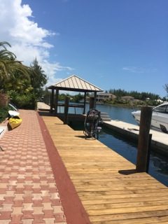 Brick path leading to a dock house